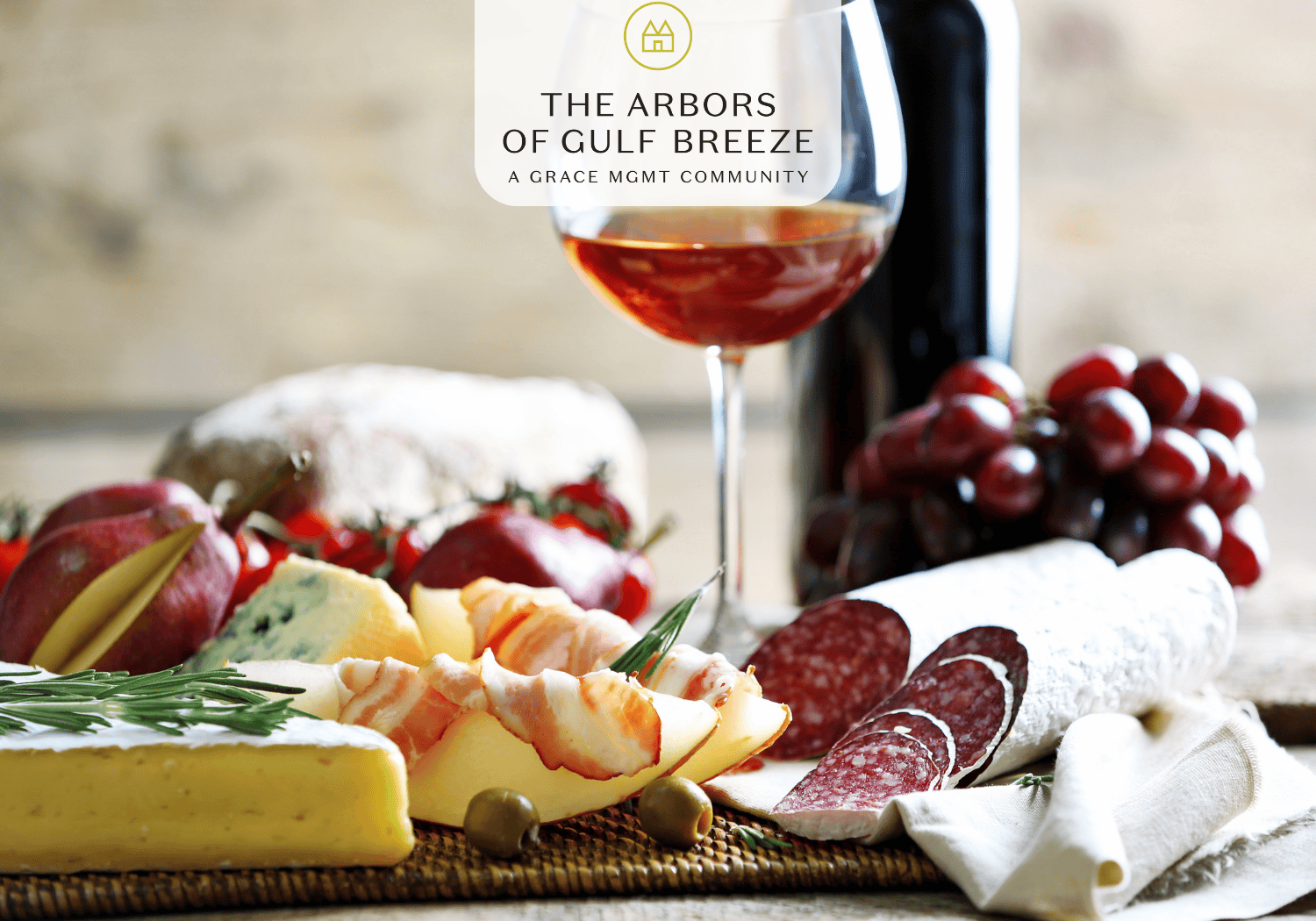 Arbors - Hearing Health Seminar 1 - The Arbors of Gulf Breeze wine next to cheese on a platter